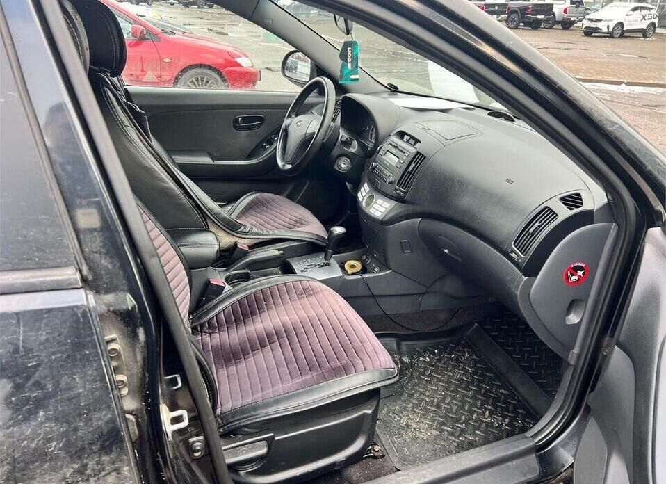 Hyundai Elantra, IV (HD) 1.6 AT (122 л.с.)