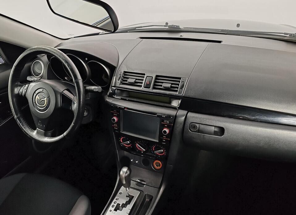 Mazda 3 1.6 AT (105 л.с.)