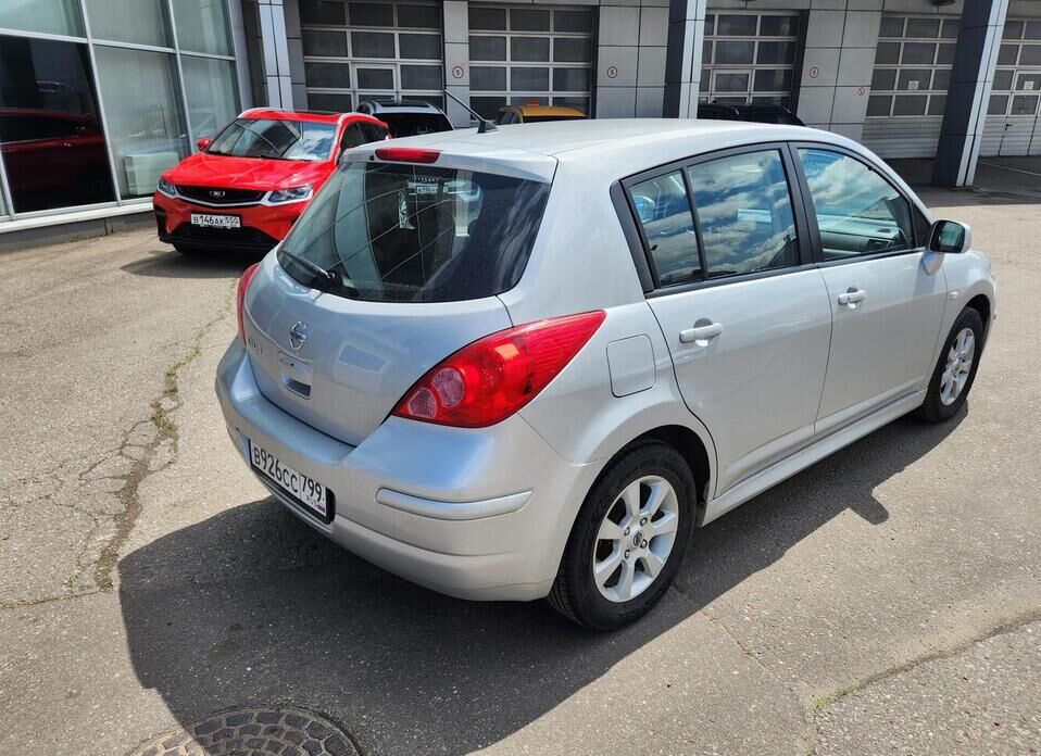 Nissan Tiida 1.6 AT (110 л.с.)