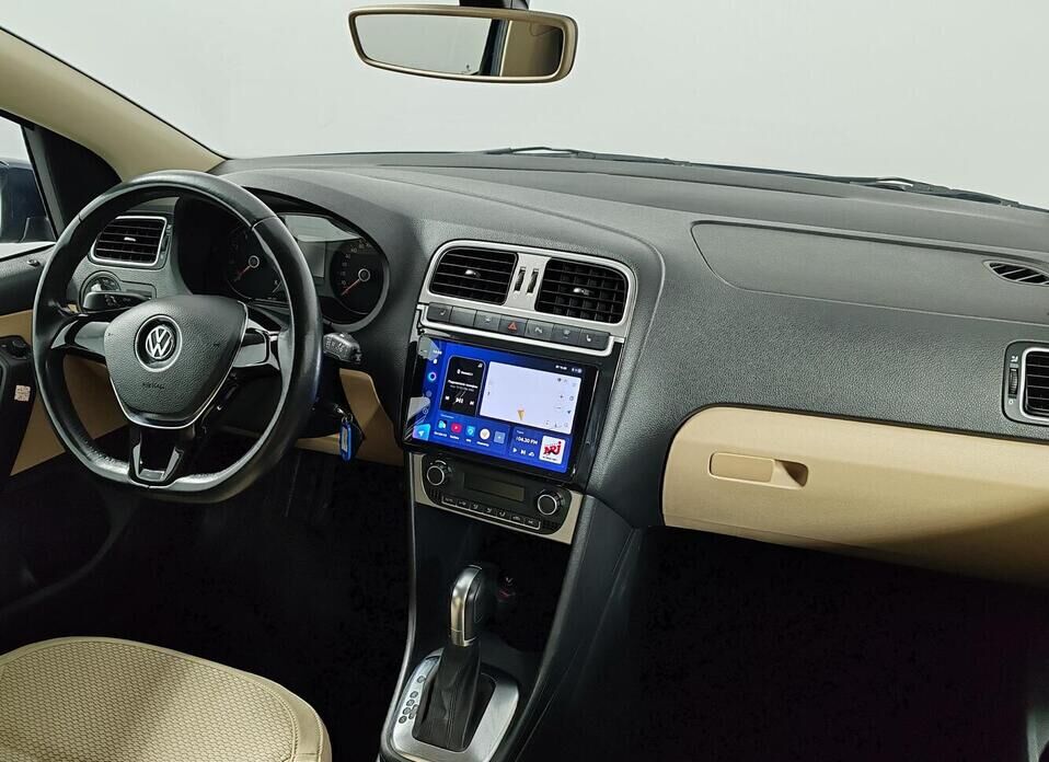 Volkswagen Polo 1.6 AT (110 л.с.)