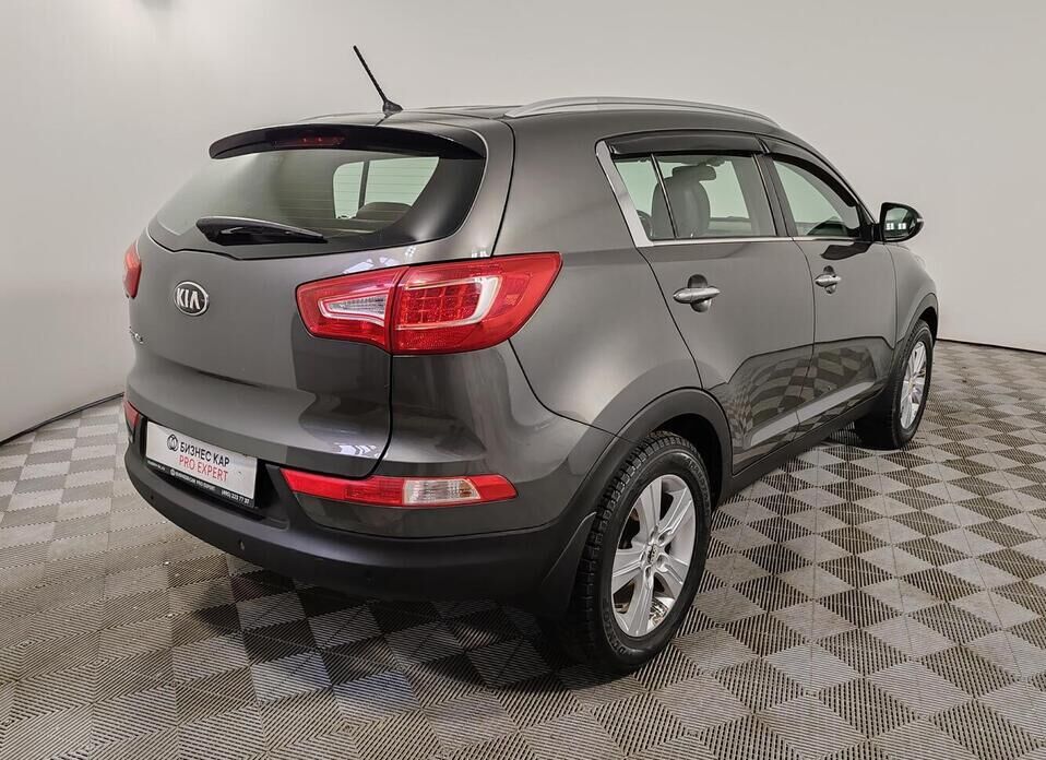Kia Sportage, III 2.0 AT (150 л.с.)