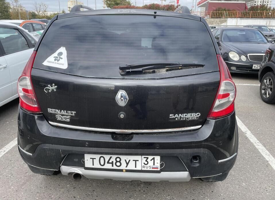 Renault Sandero, I 1.6 AT (103 л.с.)