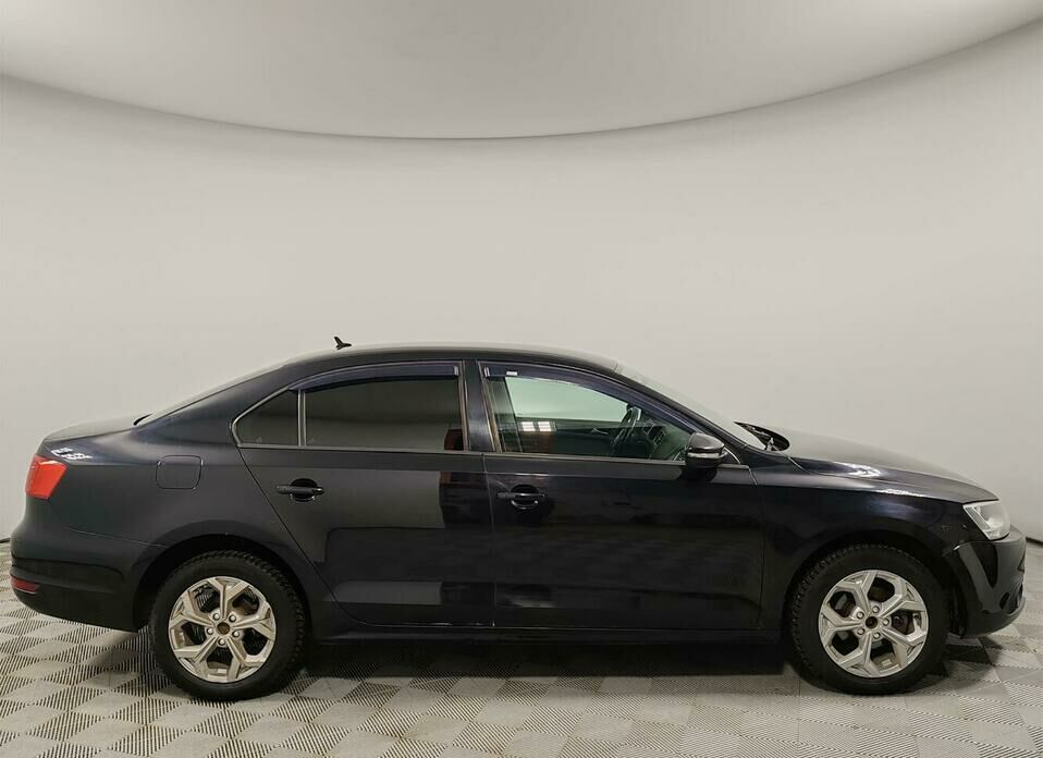 Volkswagen Jetta 1.6 AT (105 л.с.)