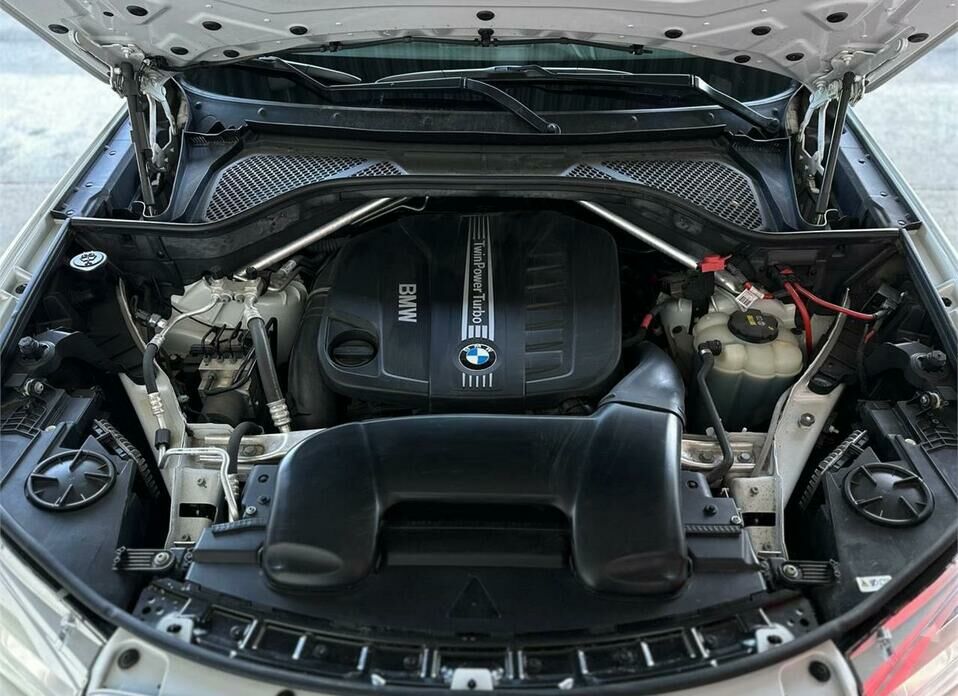BMW X6 M 4.4 AT (575 л.с.) 4WD