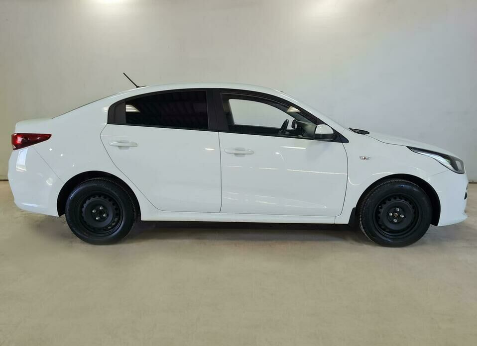 Kia Rio 1.6 AT (123 л.с.)