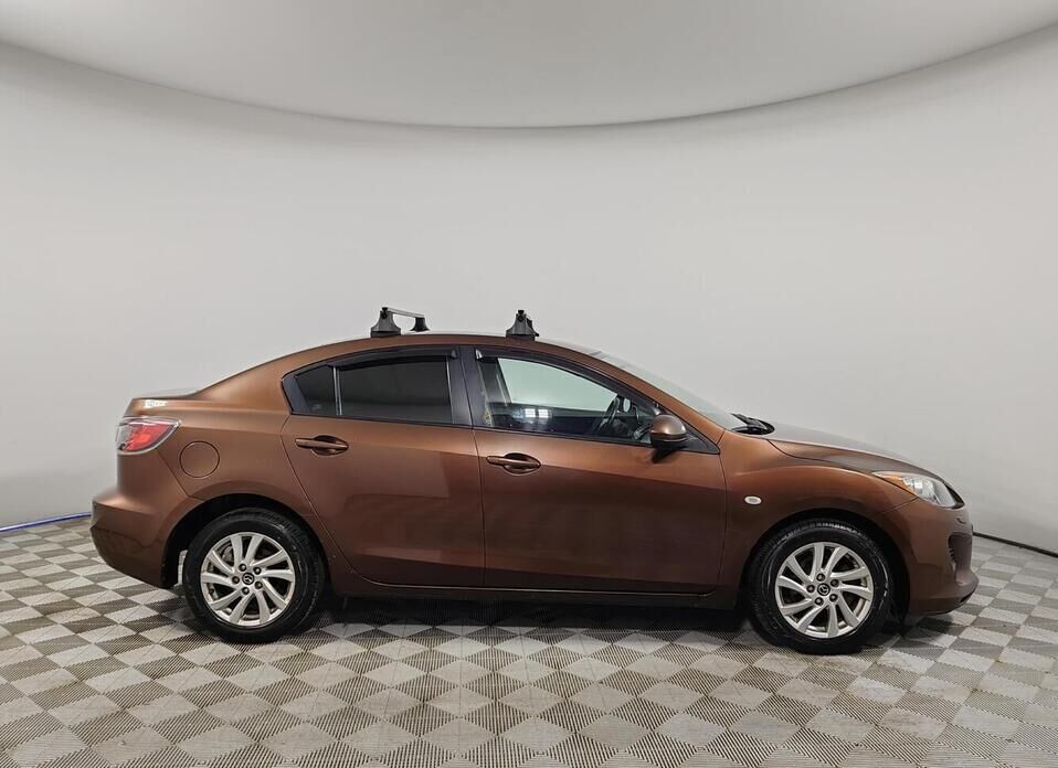 Mazda 3, II (BL) Рестайлинг 1.6 AT (105 л.с.)