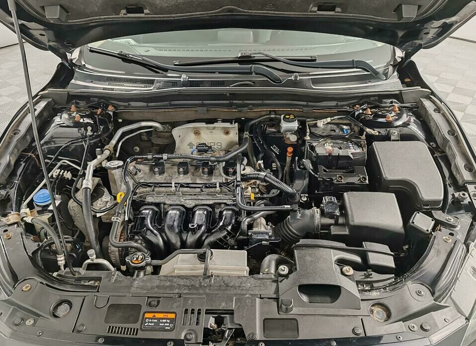 Mazda 3 1.6 AT (104 л.с.)