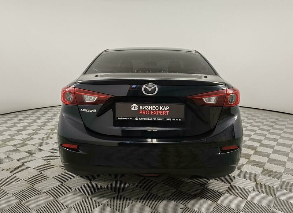 Mazda 3 1.6 AT (104 л.с.)