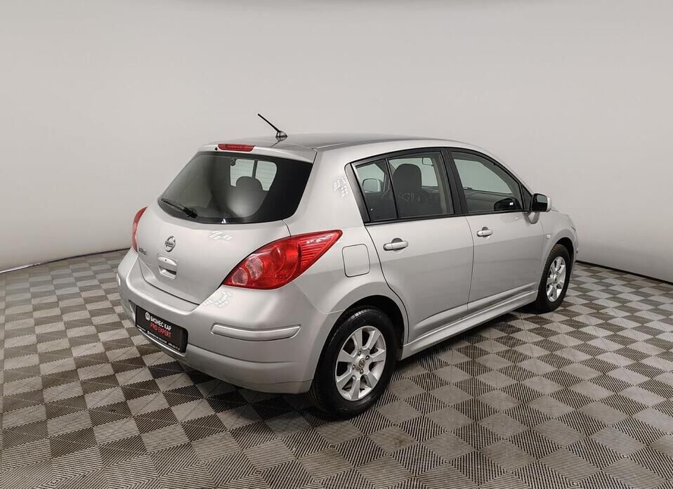 Nissan Tiida 1.6 AT (110 л.с.)