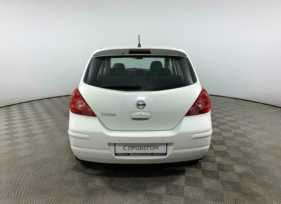 Nissan Tiida 1.6 AT (110 л.с.)