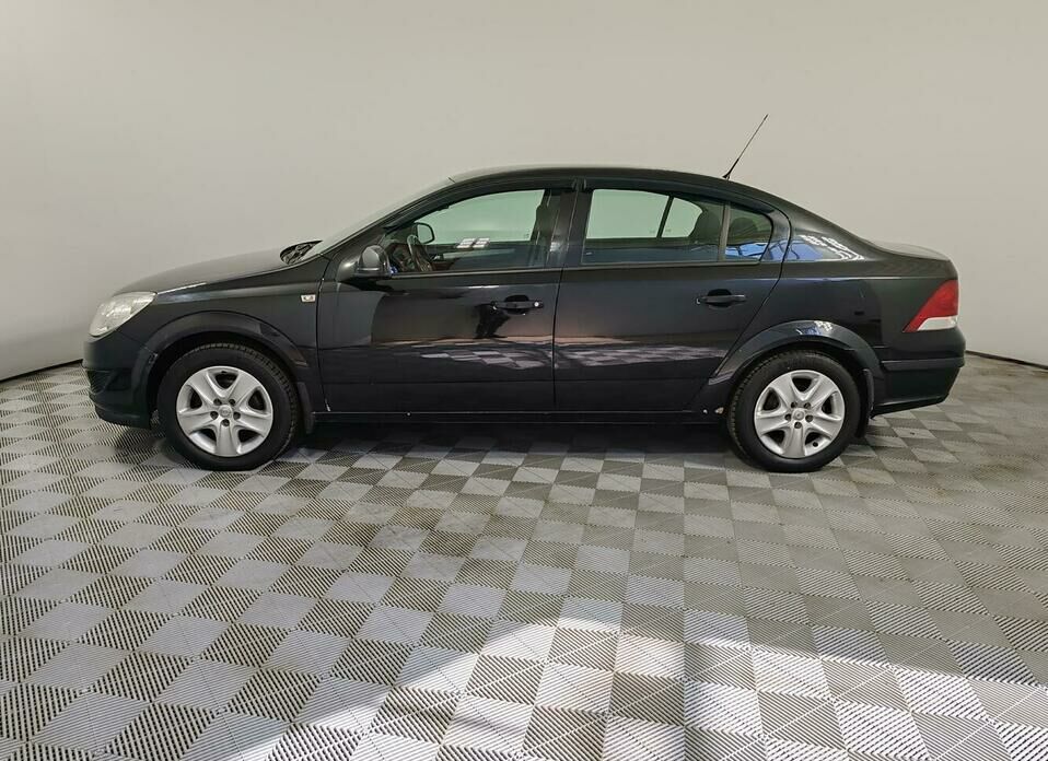 Opel Astra 1.8 AT (140 л.с.)