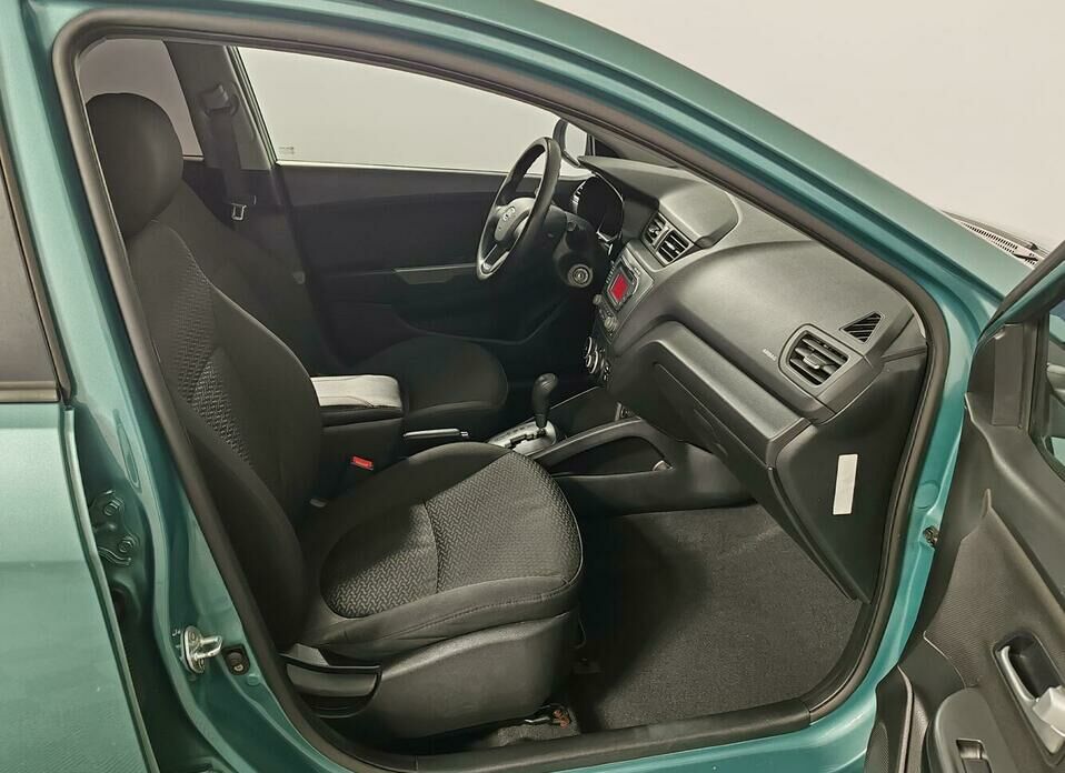 Kia Rio 4-speed 1.6 AT (123 л.с.)
