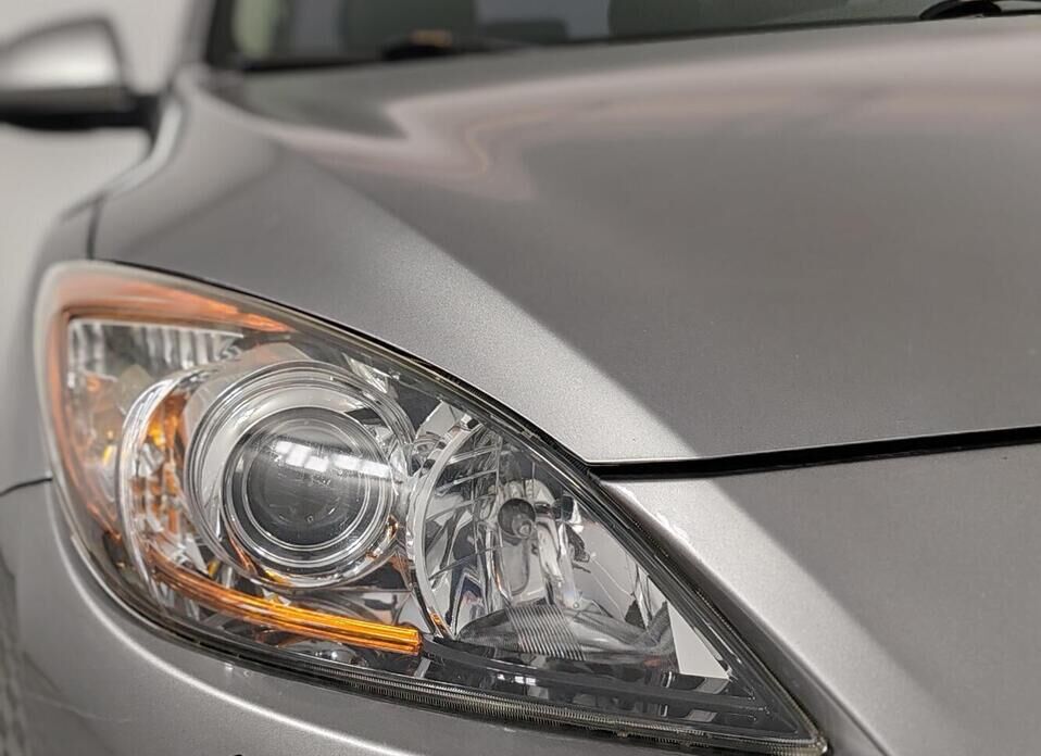 Mazda 3 1.6 AT (105 л.с.)
