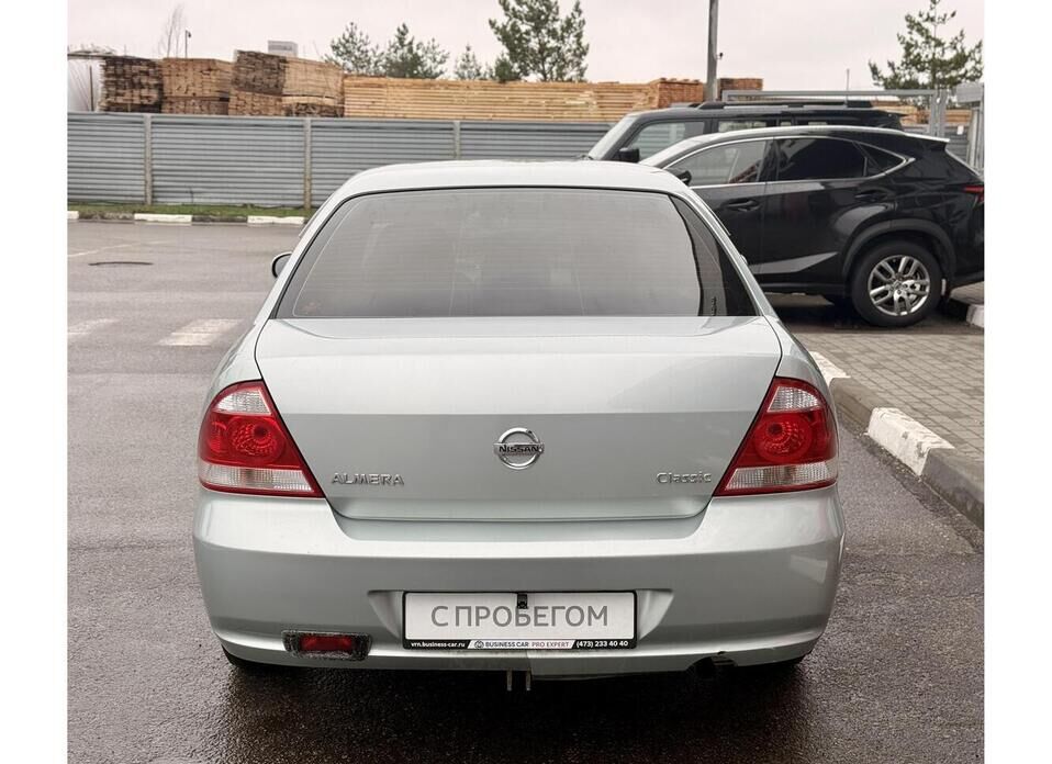 Nissan Almera Classic, I 1.6 MT (107 л.с.)
