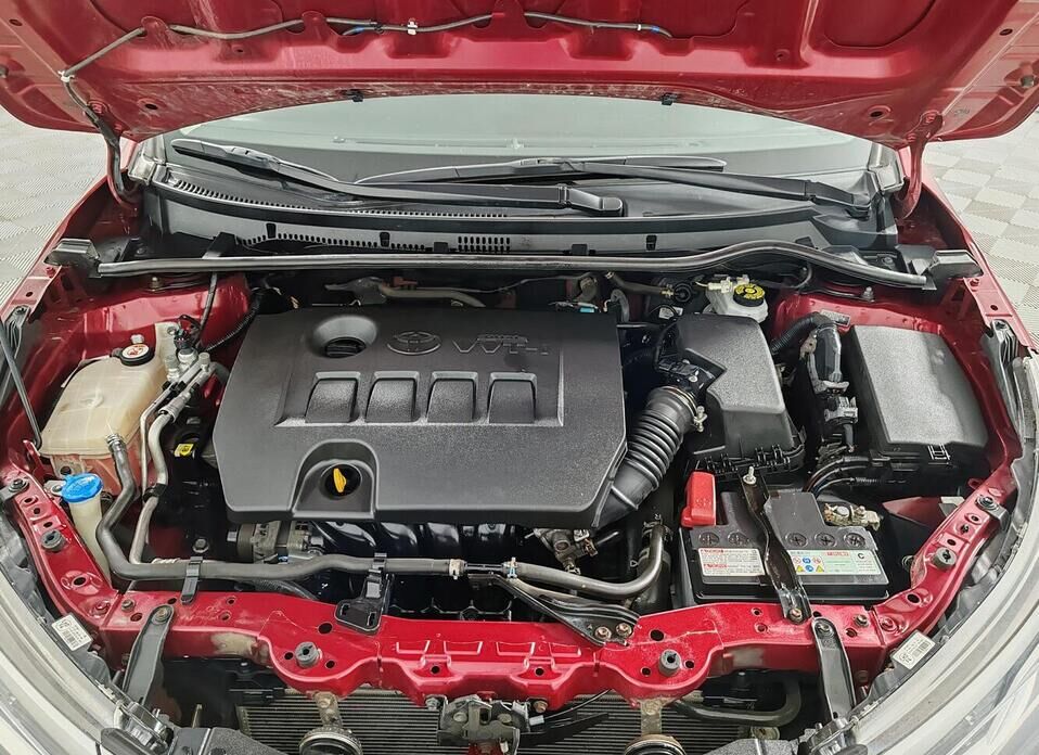 Toyota Corolla, XI (E160, E170) Рестайлинг 1 1.6 CVT (122 л.с.)