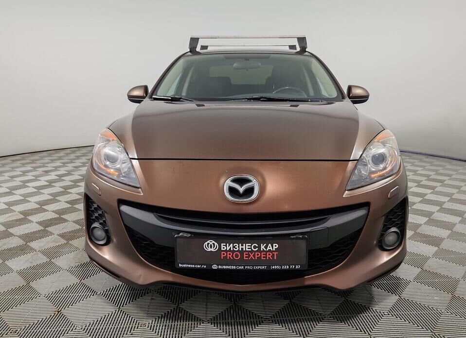 Mazda 3, II (BL) Рестайлинг 1.6 AT (105 л.с.)
