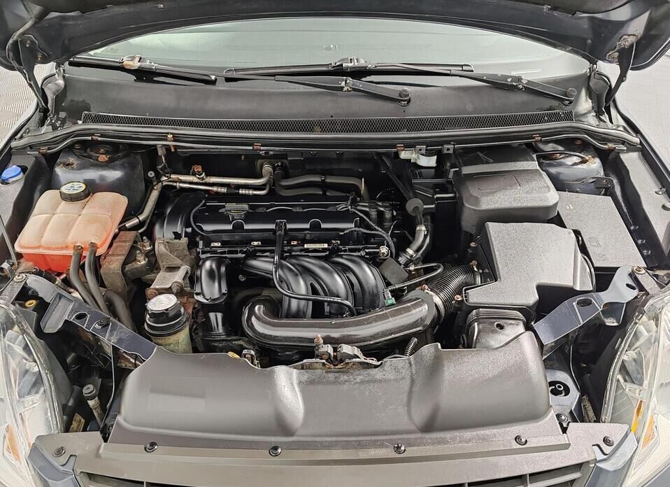 Ford Focus, II Рестайлинг 1.6 AT (100 л.с.)