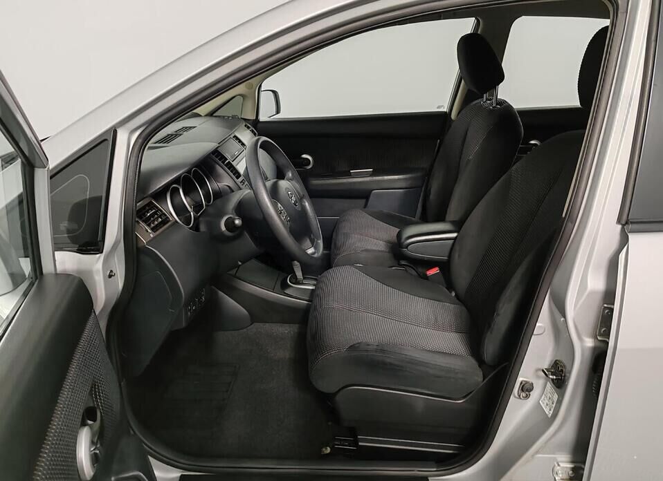 Nissan Tiida 1.6 AT (110 л.с.)