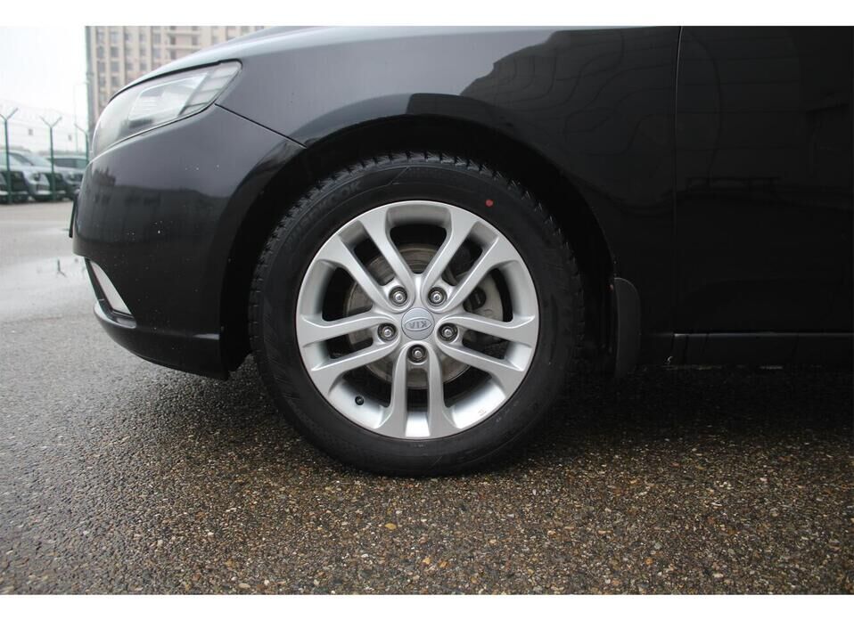 Kia Cerato, II 4-speed 1.6 AT (126 л.с.)