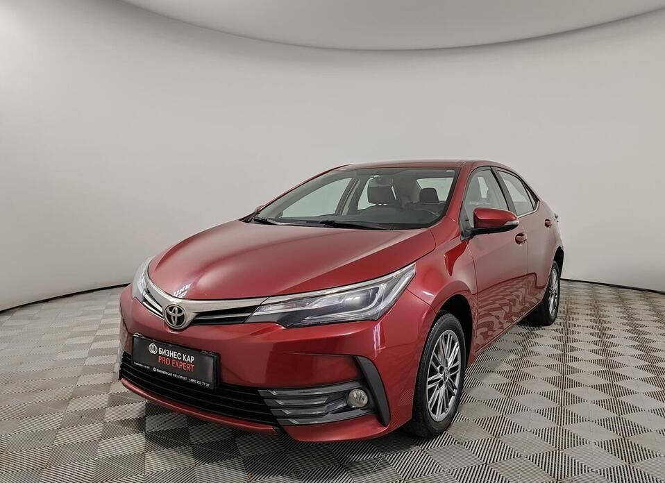 Toyota Corolla, XI (E160, E170) Рестайлинг 1 1.6 CVT (122 л.с.)