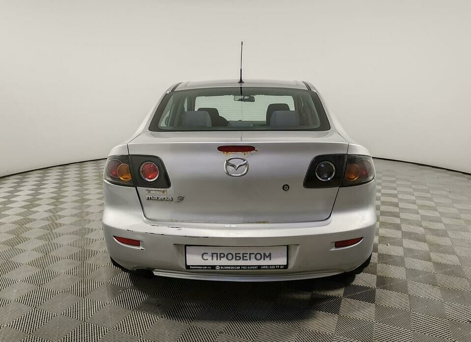 Mazda 3 1.6 AT (105 л.с.)