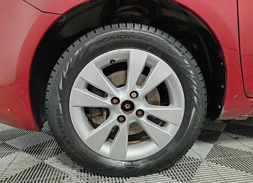 Nissan Note, I Рестайлинг 1.6 AT (110 л.с.)