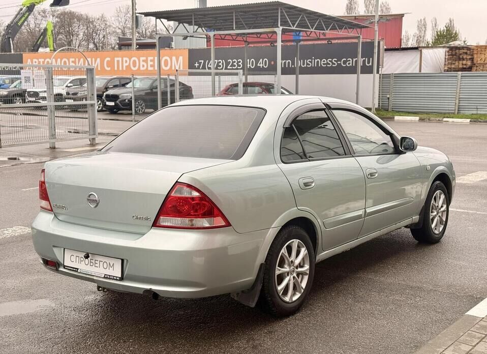 Nissan Almera Classic, I 1.6 MT (107 л.с.)