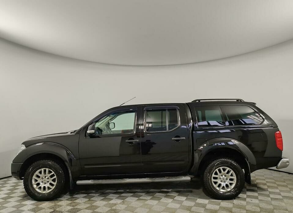 Nissan Navara (Frontier) 2.5d MT (174 л.с.) 4WD