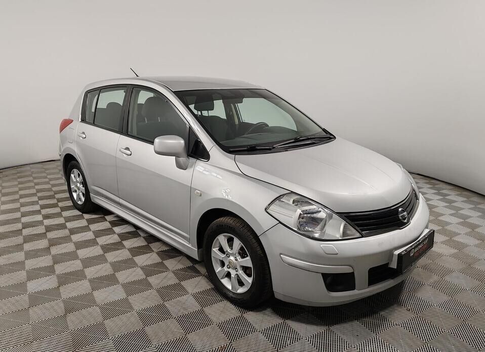 Nissan Tiida 1.6 AT (110 л.с.)