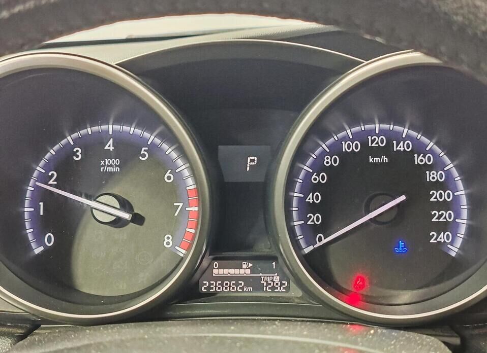 Mazda 3, II (BL) Рестайлинг 1.6 AT (105 л.с.)