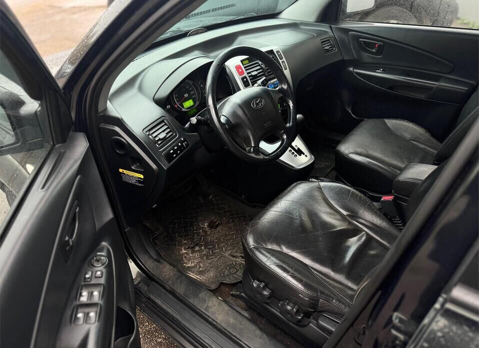 Hyundai Tucson, I 2.0 AT (141 л.с.) 4WD