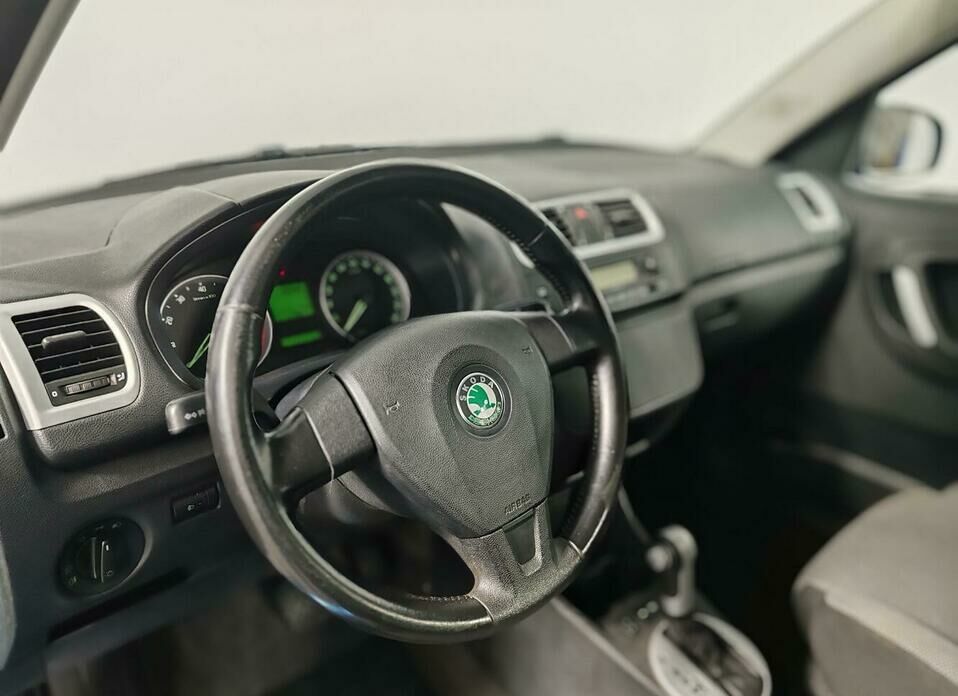 Skoda Roomster 1.6 AT (105 л.с.)
