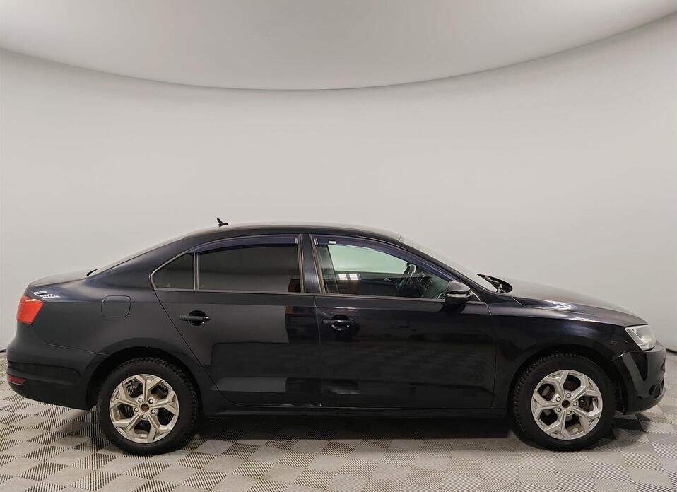 Volkswagen Jetta 1.6 AT (105 л.с.)