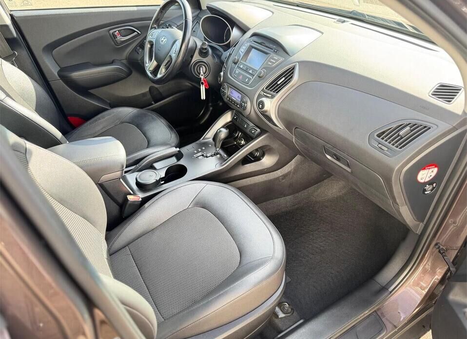 Hyundai ix35, I Рестайлинг 2.0 AT (150 л.с.) 4WD
