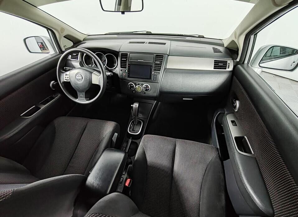 Nissan Tiida 1.6 AT (110 л.с.)
