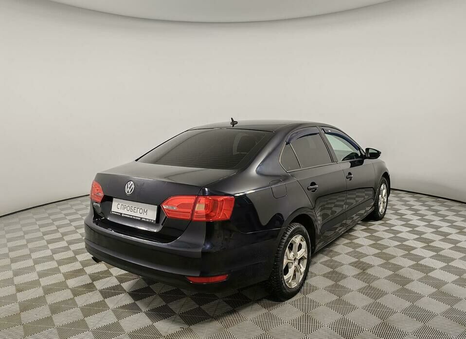Volkswagen Jetta 1.6 AT (105 л.с.)