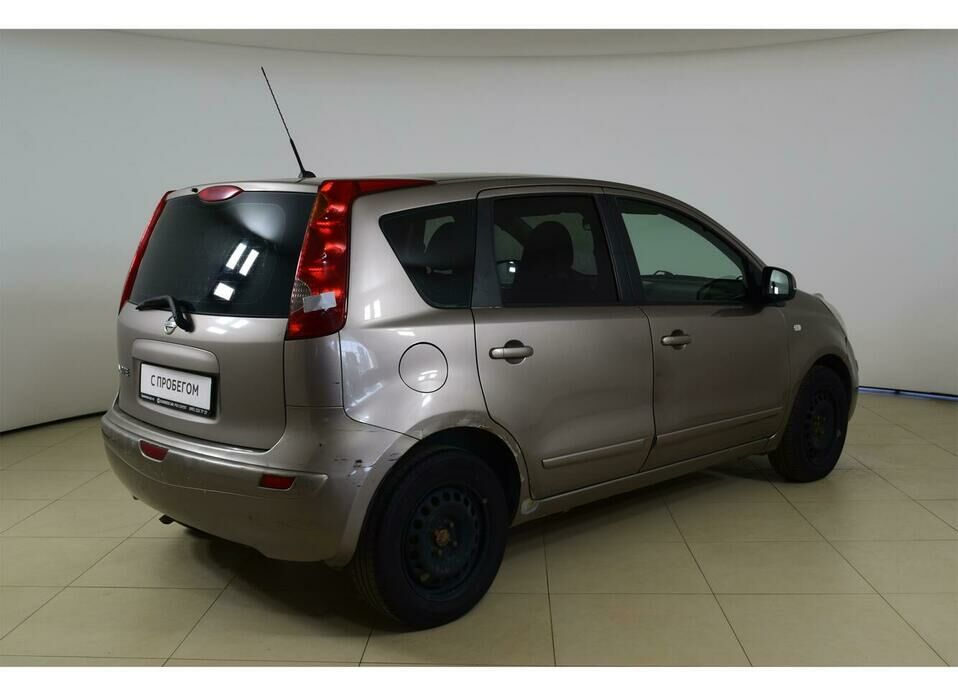 Nissan Note 1.6 MT (110 л.с.)