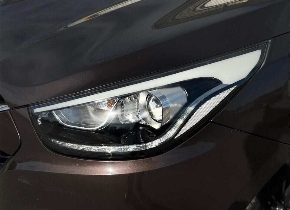 Hyundai ix35, I Рестайлинг 2.0 AT (150 л.с.) 4WD