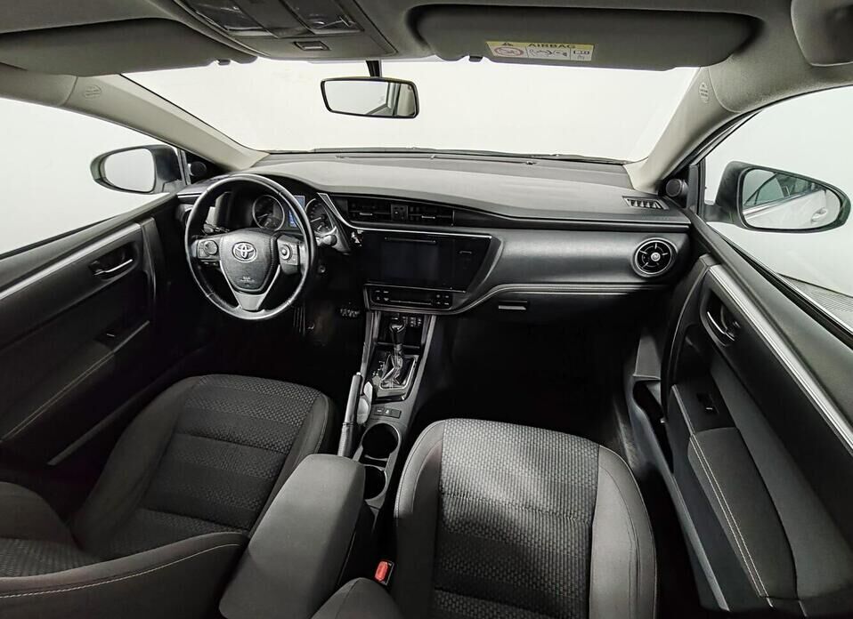 Toyota Corolla, XI (E160, E170) Рестайлинг 1.6 CVT (122 л.с.)