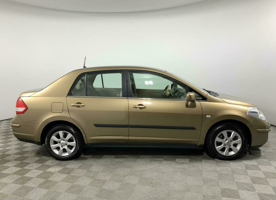 Nissan Tiida 1.6 AT (110 л.с.)