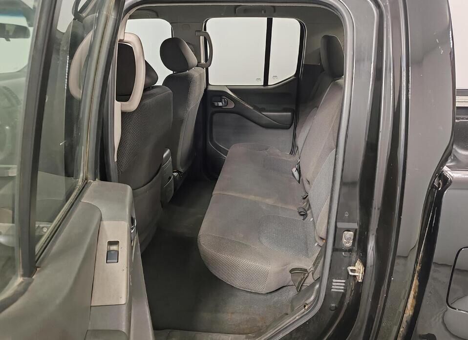 Nissan Navara (Frontier), III (D40) 2.5d AT (174 л.с.) 4WD