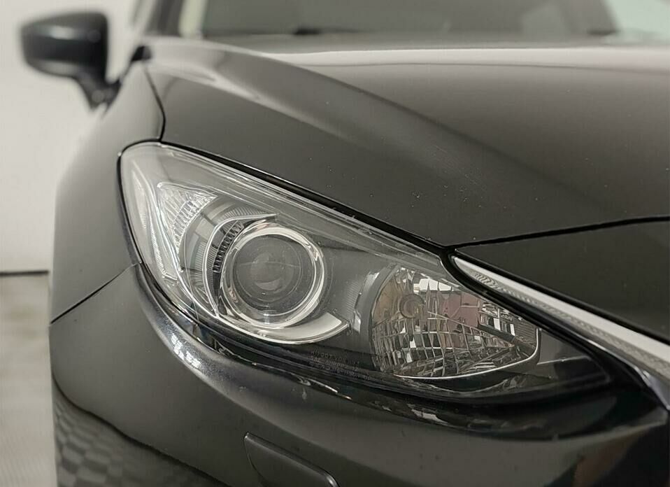 Mazda 3 1.6 AT (104 л.с.)