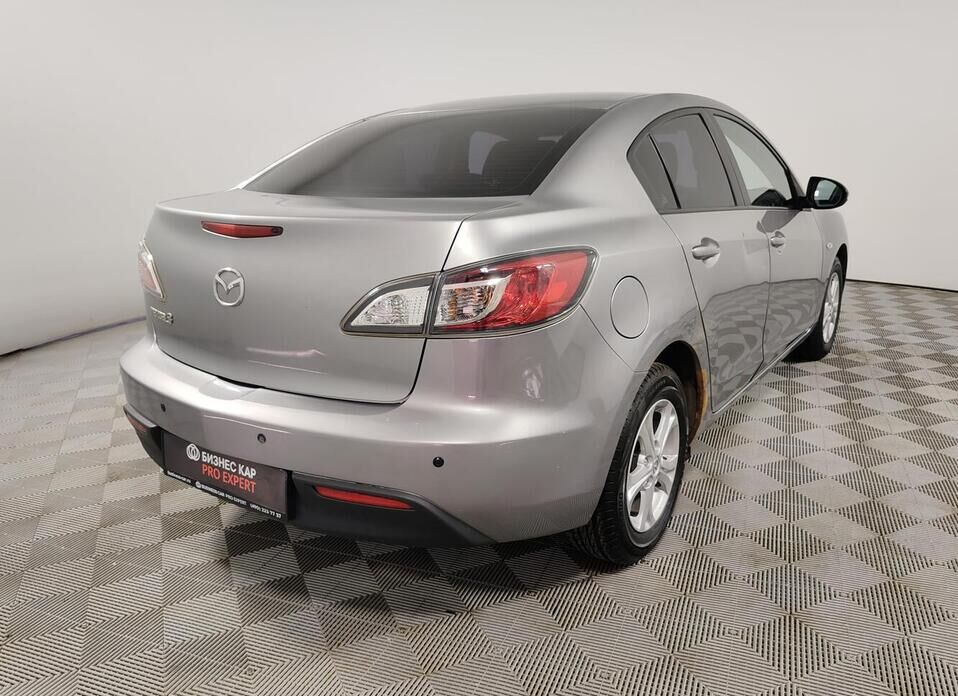 Mazda 3 1.6 AT (105 л.с.)