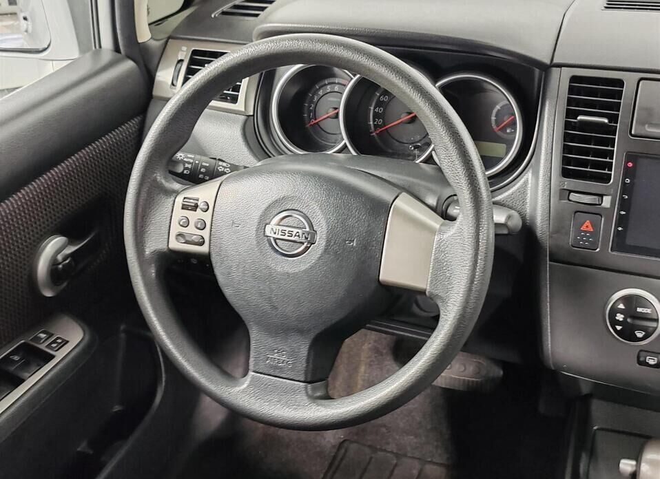 Nissan Tiida 1.6 AT (110 л.с.)