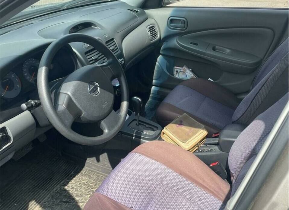 Nissan Almera Classic 1.6 AT (107 л.с.)