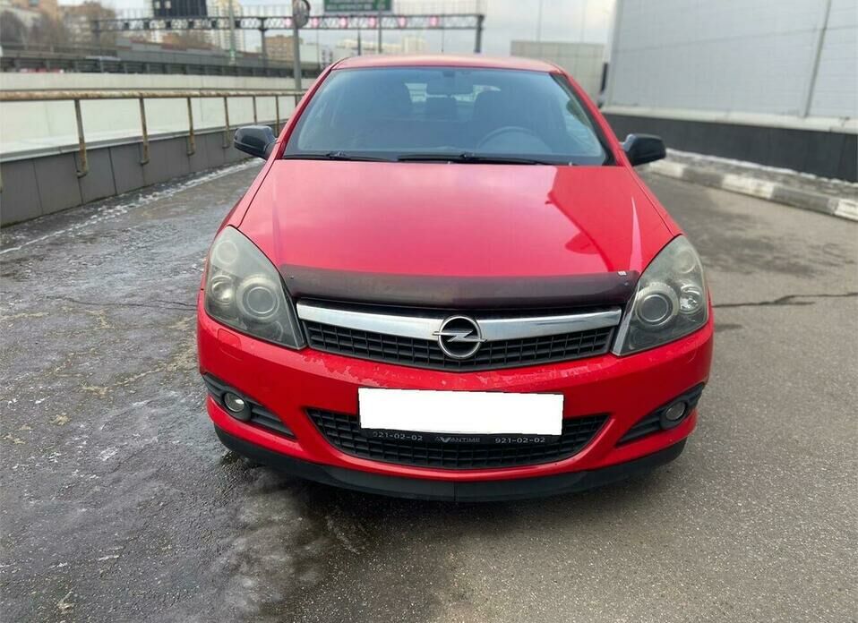 Opel Astra GTC 1.8 AT (140 л.с.)