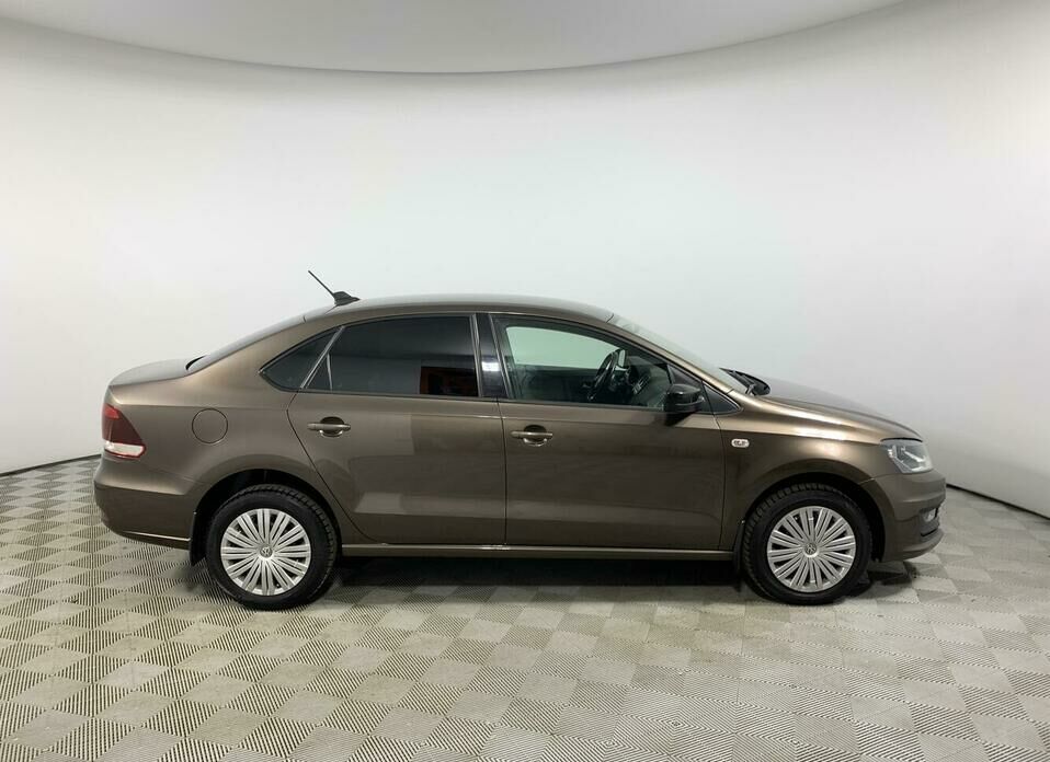 Volkswagen Polo 1.6 AT (110 л.с.)