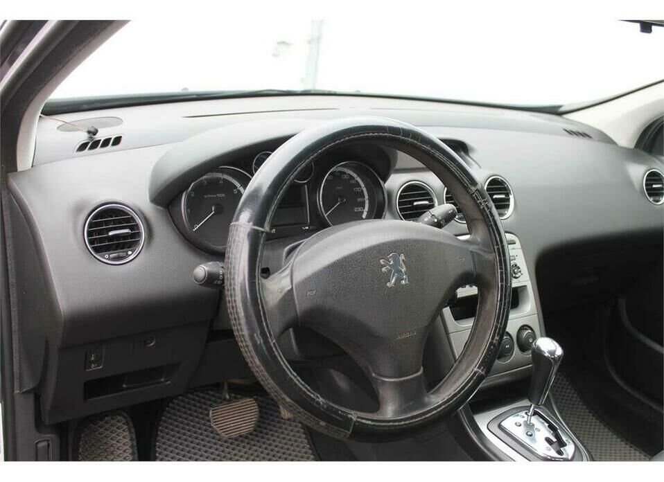 Peugeot 308 1.6 AT (120 л.с.)