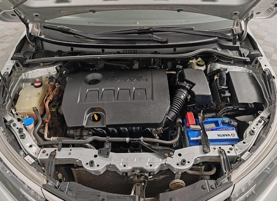 Toyota Corolla, XI (E160, E170) 1.6 CVT (122 л.с.)