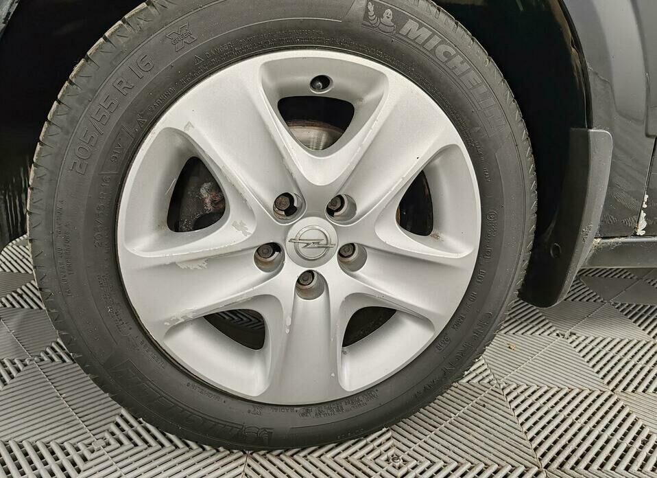 Opel Astra 1.8 AT (140 л.с.)